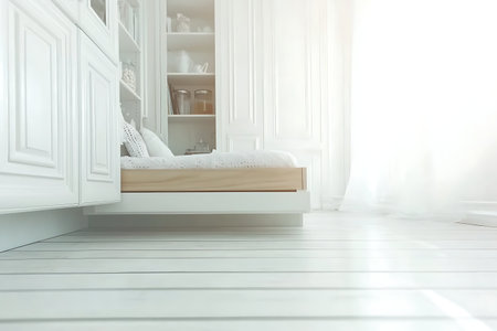 This modern bedroom features a minimalist design with a soft white color palette, emphasizing light and tranquility for a relaxing atmosphere.の写真素材
