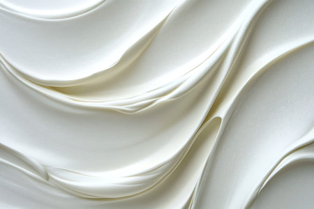 This image showcases a smooth and silky white creamy texture, featuring gentle flowing waves. Ideal...