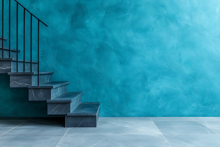 Bright and airy modern interior showcasing a blue textured wall and a sleek staircase. Perfect for design inspiration and home decor projects.の写真素材