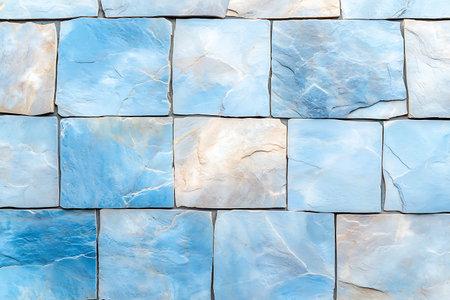 Discover an elegant blue stone wall featuring unique textures and patterns, perfect for various design projects that require a modern and natural backdrop.の写真素材