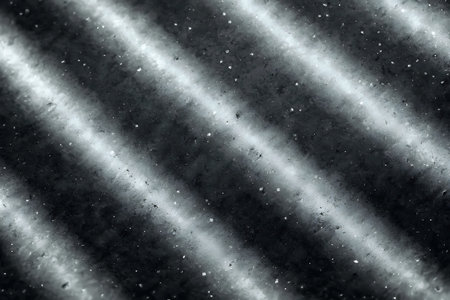 Discover a captivating abstract texture showcasing dark surface with light stripes. The interplay of...