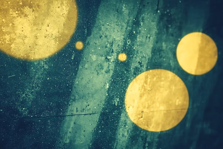 Stunning abstract image featuring vibrant yellow circles on a textured teal background. Perfect for...