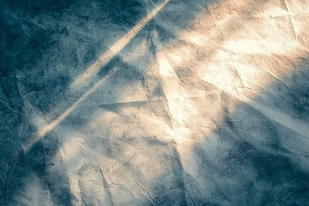 This abstract textured background features soft light and subtle shadows, perfect for artistic...