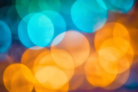 A vibrant and colorful abstract background featuring soft, defocused lights in warm and cool tones,...