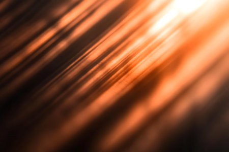 Explore the captivating interplay of light and shadow in warm tones. This abstract image captures...