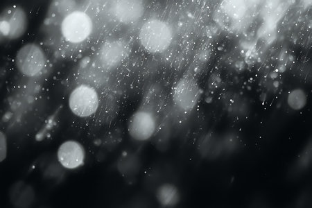 An artistic representation of rain droplets creating a stunning bokeh effect against a dark...