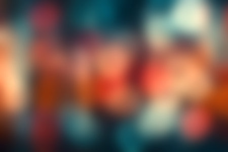 This abstract image features colorful bokeh lights in soft focus, creating a dreamy and vibrant background ideal for artistic projects or festive themes.の写真素材