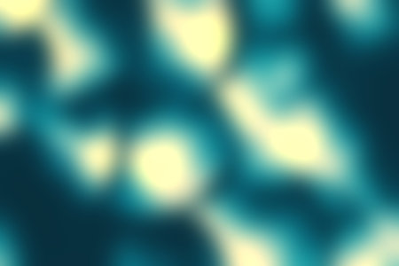 Explore an abstract close-up featuring smooth circular forms in teal and soft grey tones, creating a calming and modern aesthetic ideal for design projects.の写真素材