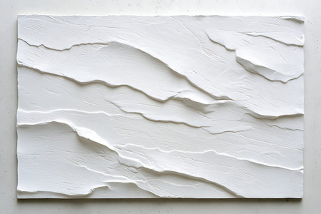 This captivating textured white plaster wall art features intricate patterns and subtle depth,...