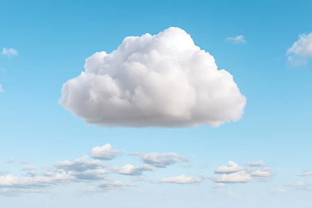 A soft white cloud floats against a clear blue sky, creating a serene atmosphere. Fluffy clouds are...