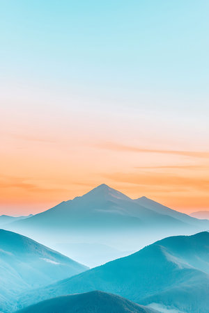 Majestic mountain landscape bathed in soft sunset hues, showcasing gentle gradients and tranquility....