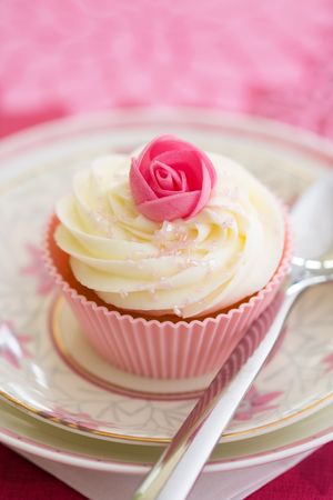 Pink rosebud cupcakeの写真素材