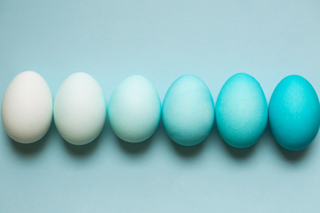 Row of ombre Easter eggsの写真素材