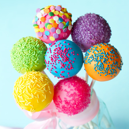 Colorful cake pops tied with a ribbonの写真素材
