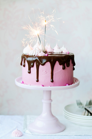 Birthday cake with sparklersの写真素材