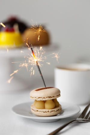 Celebration afternoon tea with sparklerの写真素材