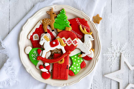 Decorated gingerbread cookies on a plateの写真素材
