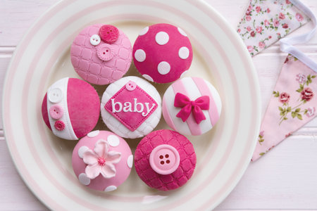 Pink baby shower cupcakes for a little girlの写真素材