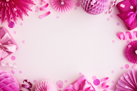 Pink party background border frame with birthday gifts and decorationsの写真素材