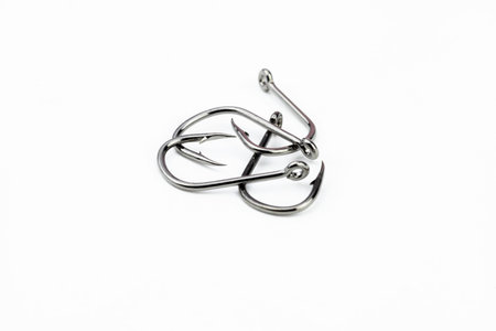 set of or heap of fishing hooks isolated on white background