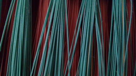 Green and pink plastic fibersの写真素材