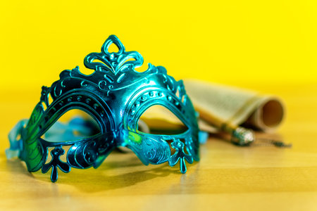 Jewish holiday Purim background with carnival mask and the Scroll of Esther.の写真素材