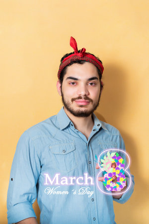 Young man celebrating International Women's Day.