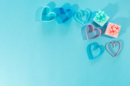 Love hearts and gifts on blue background. Valentines day card concept. Heart for Valentines Day Background. Select focus. Soft focus. top view.の写真素材