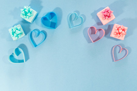Love hearts and gifts on blue background. Valentines day card concept. Heart for Valentines Day Background. Select focus. Soft focus. top view.の写真素材