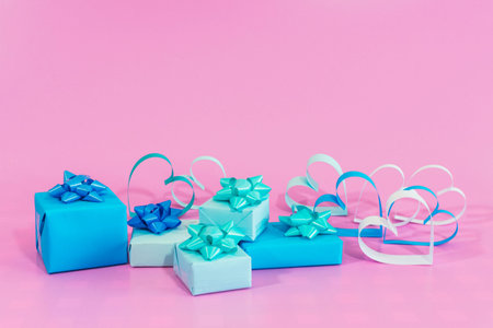 Love hearts and gifts on pink background. Valentines day card concept. mother's day concept Background. Select focus. Soft focus.の写真素材