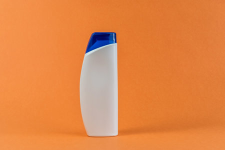 Plastic bottles on orange background. Recycling concept and environment.の写真素材