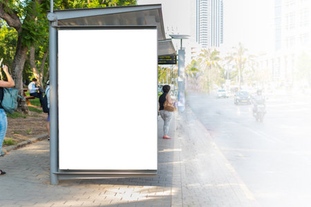 Empty billboard or kiosk advertising mockup at a bus stop, on an avenue. Kiosk Add by an Avenue.の写真素材