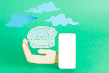 Green electric car paper cut eco friendly concept.の写真素材