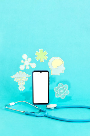Concept of telemedicine or e-health, smart device with stethoscope and medical science symbols.の写真素材