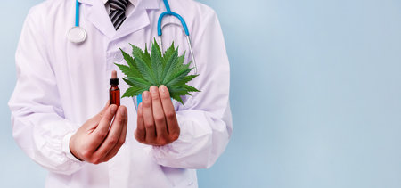 Doctor prescribing medical marijuana extract. Cannabis recipe for personal use, alternative remedy or medication.の写真素材