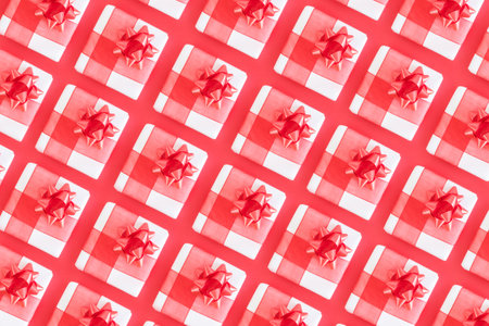 Top view of pattern small gift on red background.の写真素材
