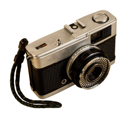 Retro film photo camera, isolated on white background.の写真素材