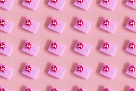 Pink Christmas presents, gift pattern. Overhead view.の写真素材