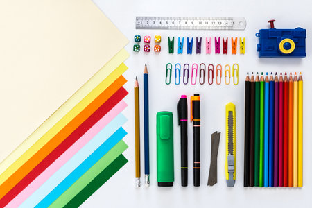 creative office work tools on white background, on top view. paper, pencils, paper clips,の写真素材