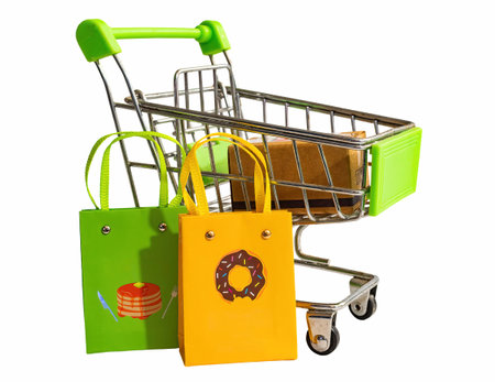 Supermarket cart with cardboard box and bags, isolated on white background. graphic resourceの写真素材