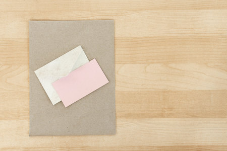 Minimalist Wedding Invitation Template, on wooden desk.