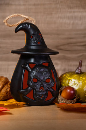 Halloween Pumpkin on wooden table in front of spooky background. Still life.の写真素材