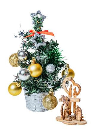 Wooden nativity scene and Christmas tree isolated on white or transparent background cutout.の写真素材