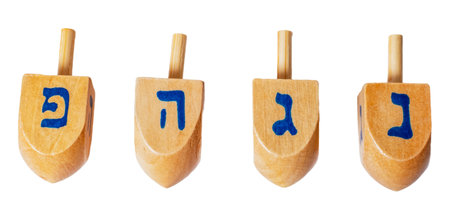 Wooden dreidels for Hanukkah isolated on white or transparent background cutout.の写真素材