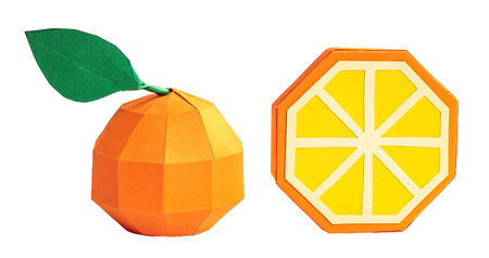 Orange fruit figures in paper craft, isolated on white or transparent background cutout.の写真素材