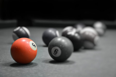 pool balls on a pool tableの写真素材