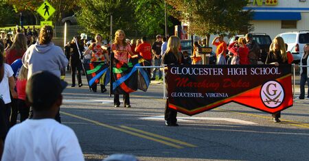 GLOUCESTER, VA, USA - OCTOBER 22: The Gloucester High School Homecoming Parade coming down Main Street. on October 22, 2011 in Gloucester, VA, USAのeditorial素材