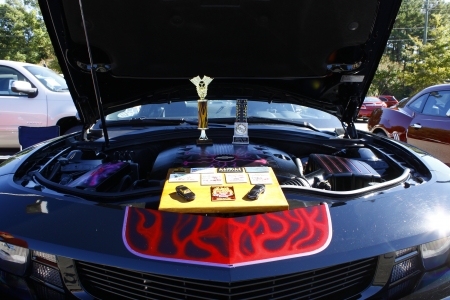 GLOUCESTER, VA- OCTOBER 13:The engine compartment of a Black Camaro at the Ken Houtz Chevrolet Buick, Camaro VS Corvette Humane Society car show and food drive in Gloucester, Virginia on October 13, 2012のeditorial素材