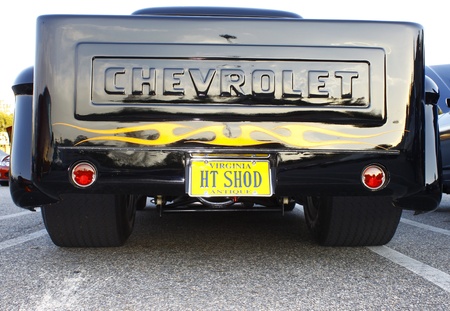 GLOUCESTER, VA- OCTOBER 12:A vintage black pickup tailgate at the 29th Annual 2012 MPCC(middle peninsula car club)meeting at the Main St shopping center in Gloucester, Virginia on October 12, 2012のeditorial素材