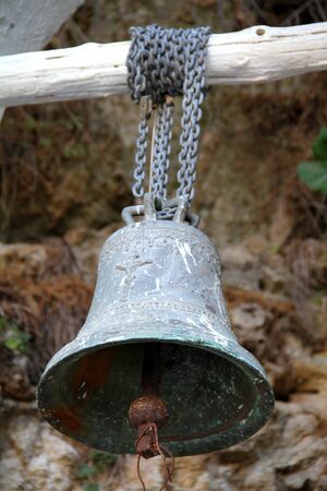 Ancient Bell Hanging On The Wooden Beam / Hanging Bellの写真素材